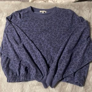 Blue cheetah Zsupply pullover sinched at bottom slightly